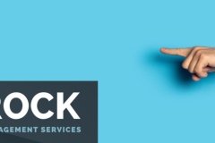 Hand points to something on a blue background. Gesture look at this, pay attention